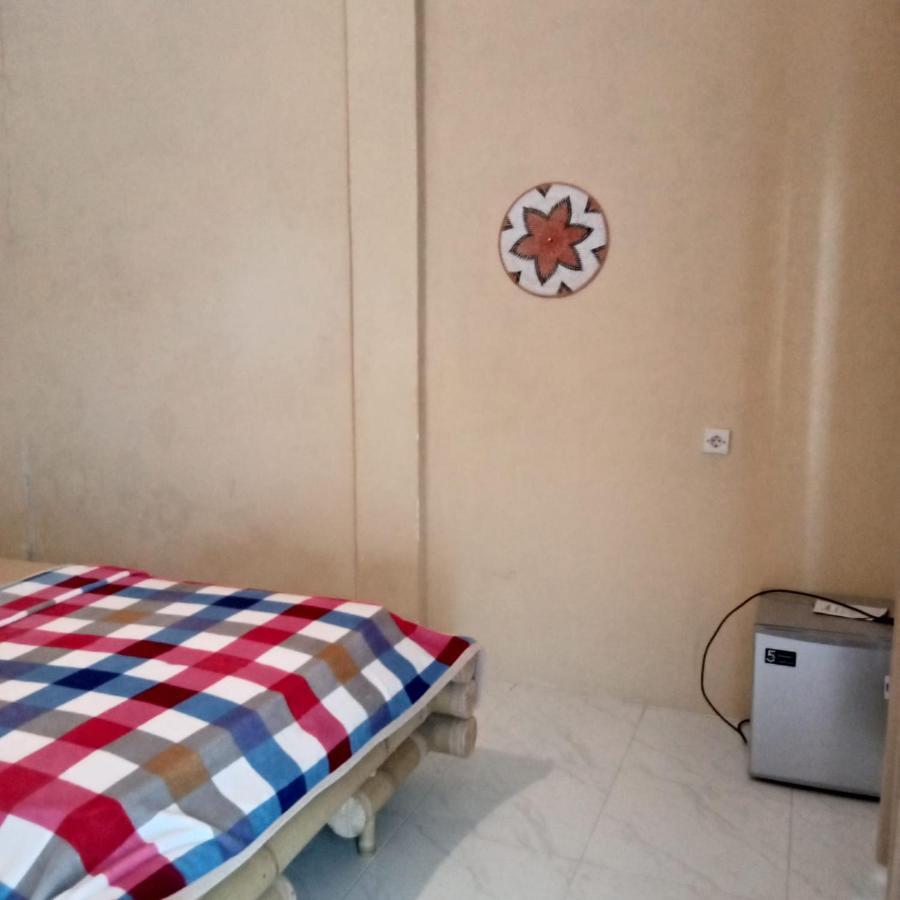 Sunrise Bukit Asam Homestay Kuta  Luaran gambar